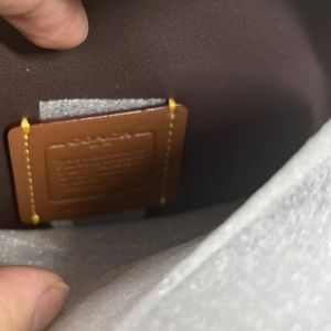 Brand new with tags sold out mini heart black quilted coach purse!